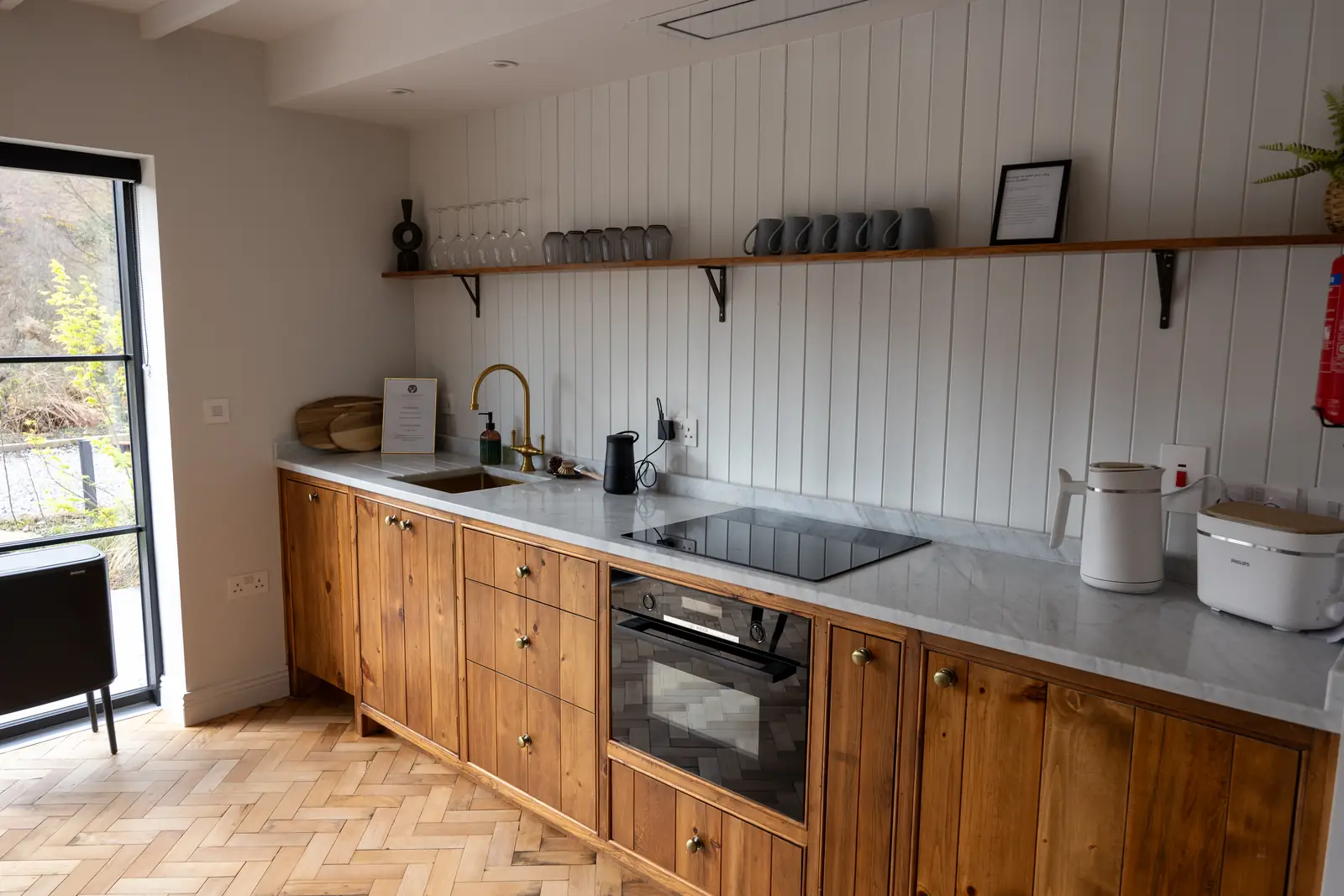 Cottage kitchen in timber and white